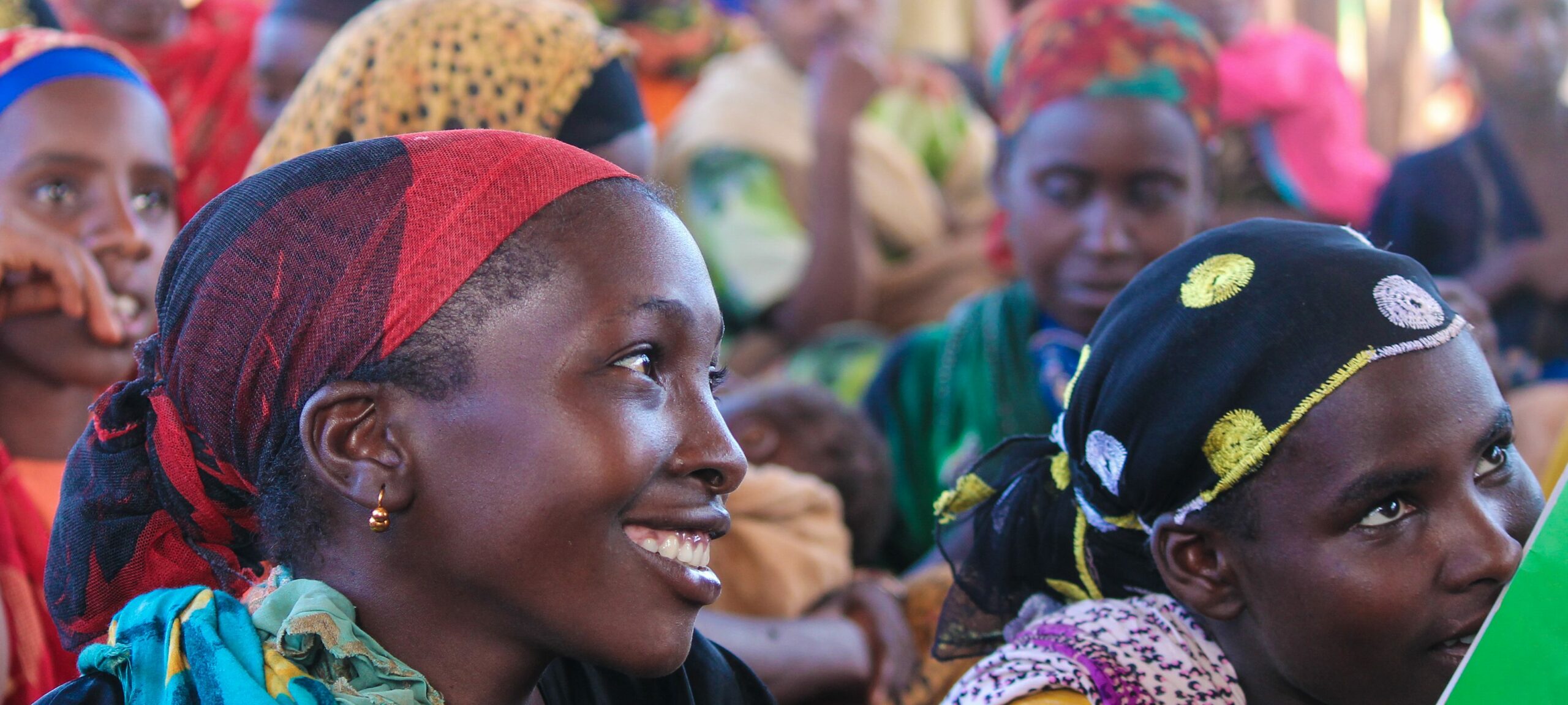 A smiling women in the crowd at Welkite Primary School in Southern Ethiopia.
